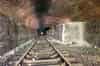 To save costs only half the chalk was excavated. The remaining chalk could be removed if the line through the tunnel was ever doubled. This view is just inside the west portal in June 1994 (Nick Catford)
