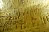 18th century graffiti on wall of stair down to lowest level chamber (Chris Rayner)
