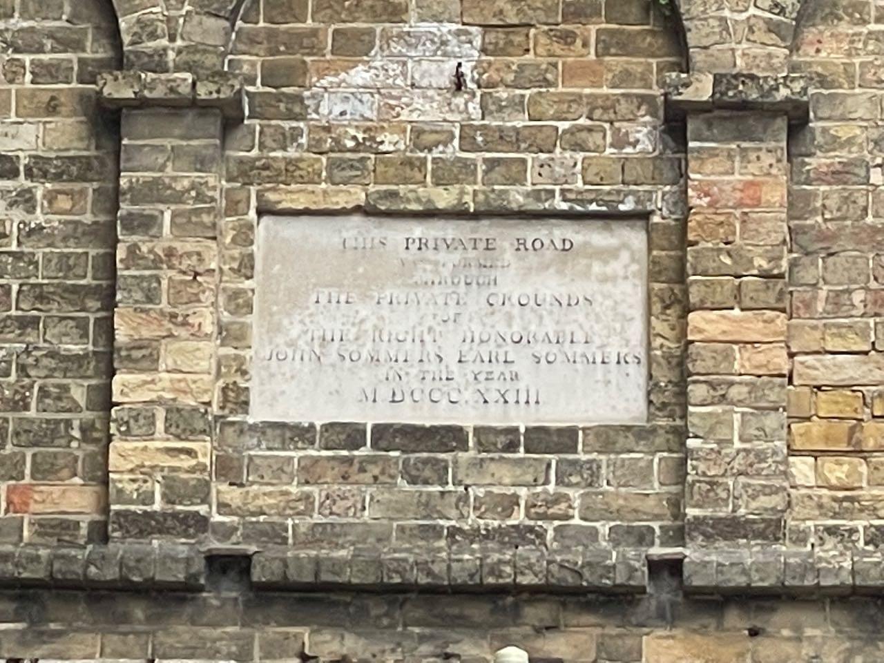 Plaque above the southern portal (Neil Iosson / 2021)