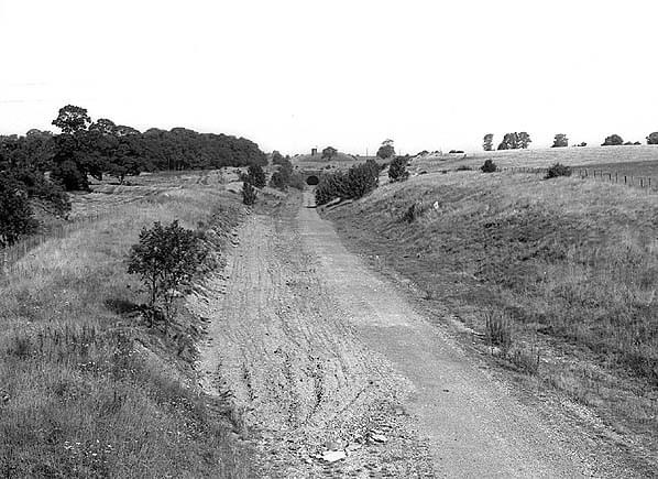 The site of Charwelton Station in 1975 with the southern portal of Catesby Tunnel visible in the distance. (Nick Catford)