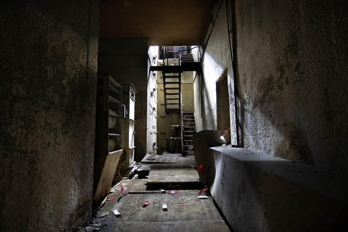 Corridor looking to emergency exit, plant room to left  (2022) (Thomas Hutchins)