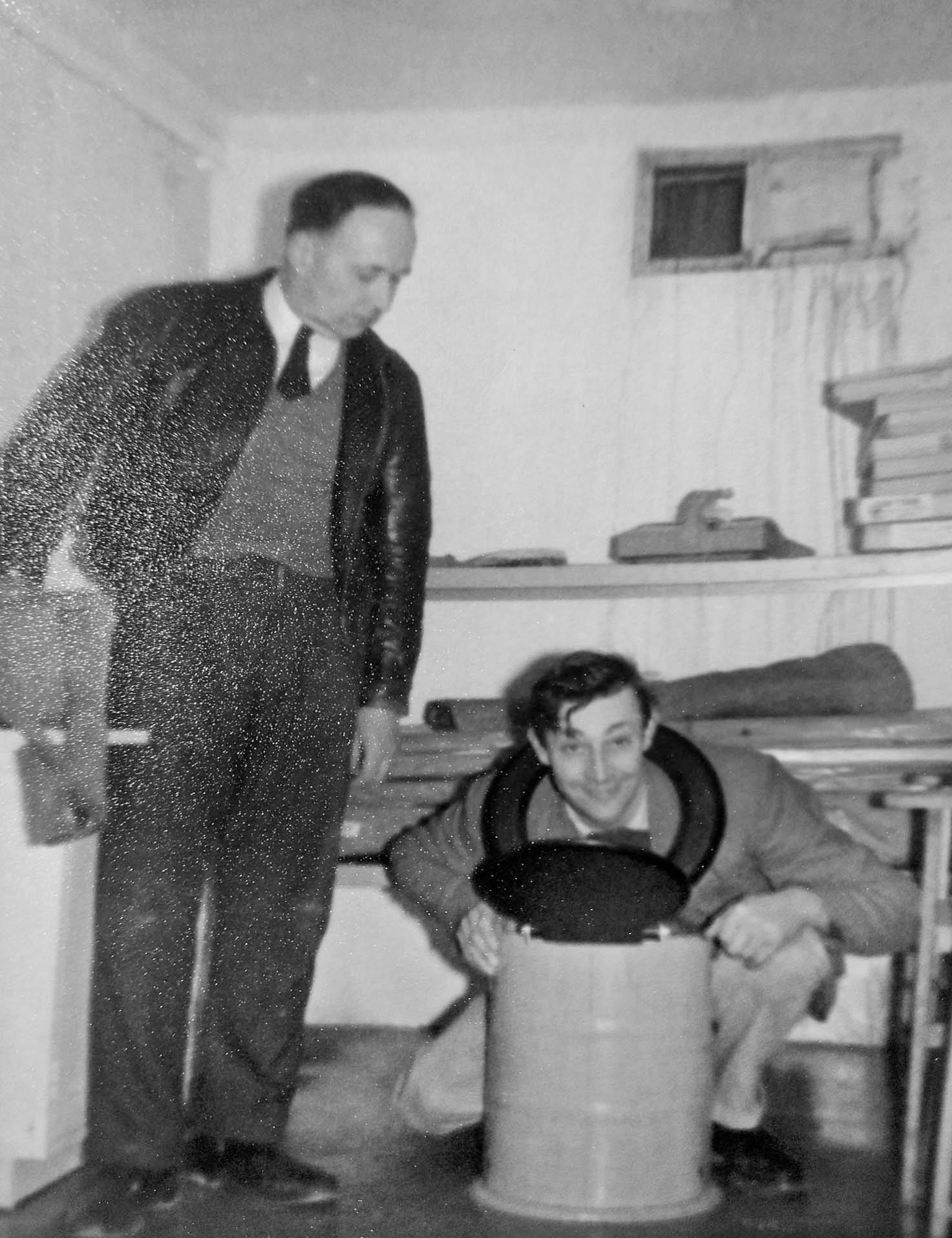 In the first picture the observer on the left (standing) is Chief Obs.  Careless who owned the ironmongers in Much Hadham. The leading observer with the toilet seat around his head is Patrick William Patmore ,who worked at Hodges Garage as a mechanic at the time. The second picture shows Leading Obs. Patmore doing some wiring. The third picture shows the Orlit with L - R Leading Obs. Patmore, Obs. Sitton (or Sutton) and Chief Obs Careless. They location of the fourth picture is unknown but it does show Much Hadham observers L - R Obs. Walter Beadle, Obs. Ernie Parker and Leading Obs. William Patmore.  The photos are from Val Russell né Patmore.  The pictures are all early 60s but as the underground post opened in May 1962 the first two must be after that date. (Nick Catford)