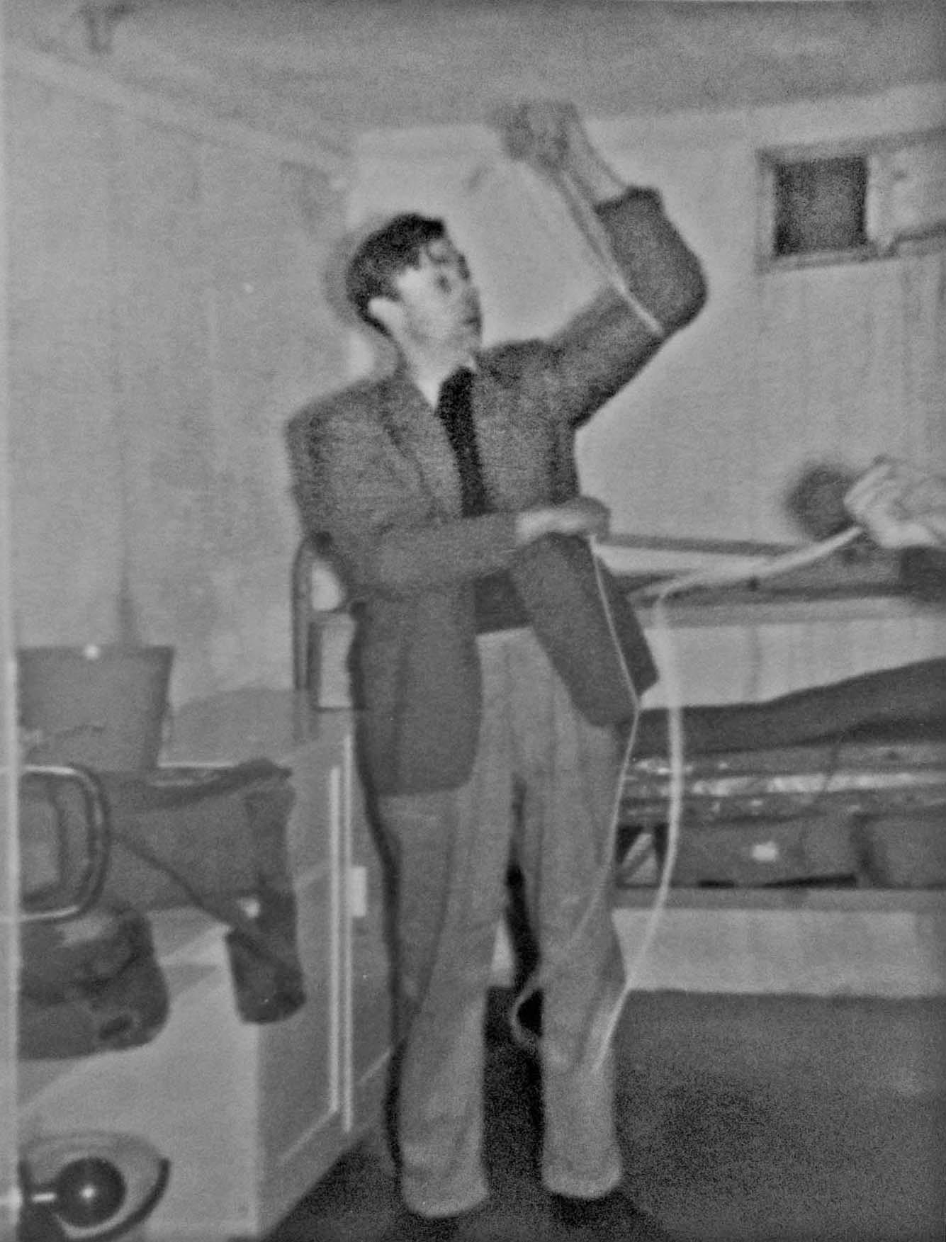 In the first picture the observer on the left (standing) is Chief Obs.  Careless who owned the ironmongers in Much Hadham. The leading observer with the toilet seat around his head is Patrick William Patmore ,who worked at Hodges Garage as a mechanic at the time. The second picture shows Leading Obs. Patmore doing some wiring. The third picture shows the Orlit with L - R Leading Obs. Patmore, Obs. Sitton (or Sutton) and Chief Obs Careless. They location of the fourth picture is unknown but it does show Much Hadham observers L - R Obs. Walter Beadle, Obs. Ernie Parker and Leading Obs. William Patmore.  The photos are from Val Russell né Patmore.  The pictures are all early 60s but as the underground post opened in May 1962 the first two must be after that date. (Nick Catford)